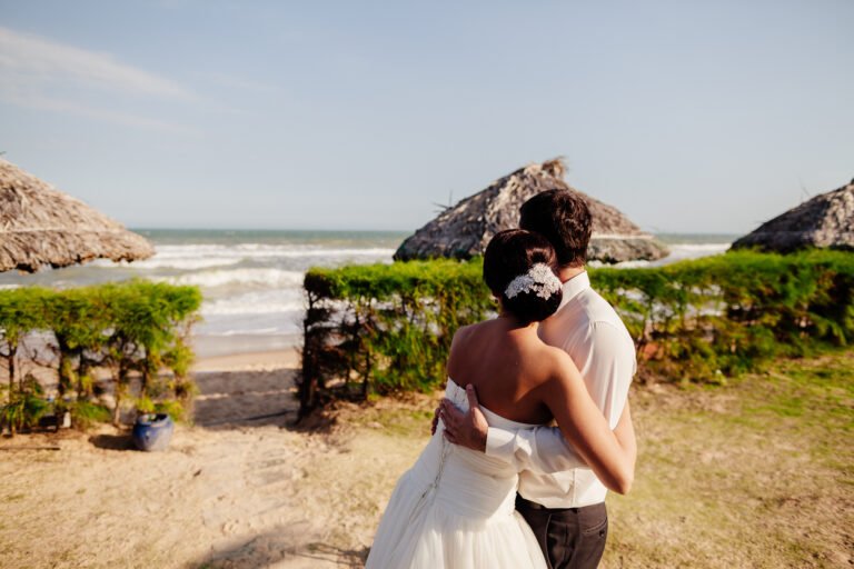 couple relax on beach resort. Sea view and palm trees in Asia, Vietnam